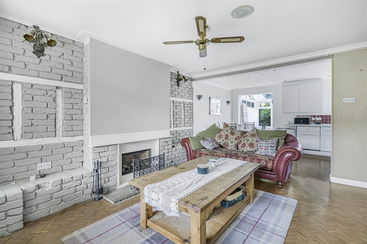 Main sitting room with feature fireplace