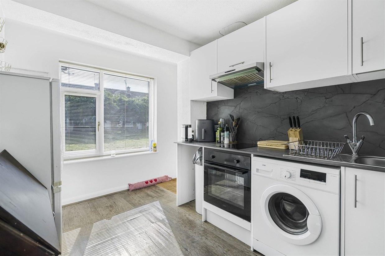 Annex kitchen with oven and washing machine