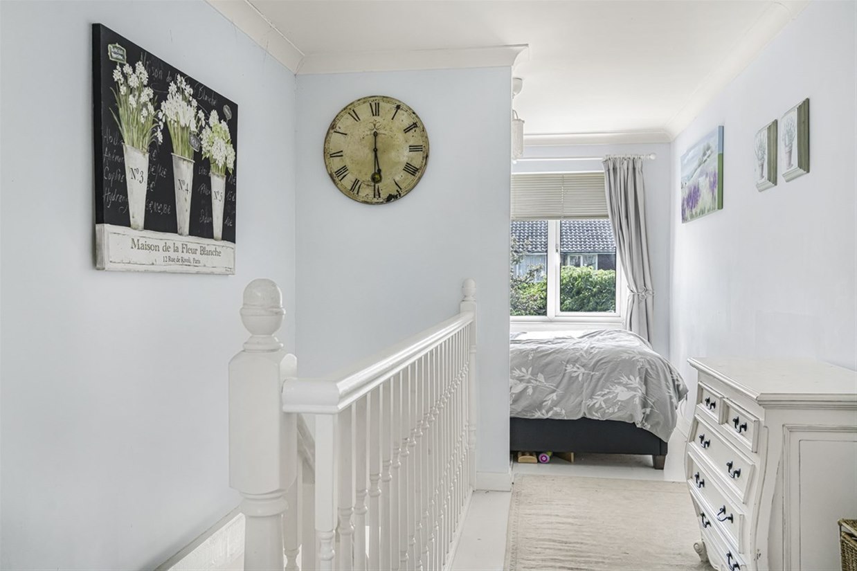 Bedroom and landing in the main house