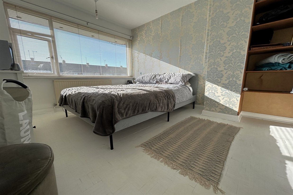 Annex bedroom with fitted storage